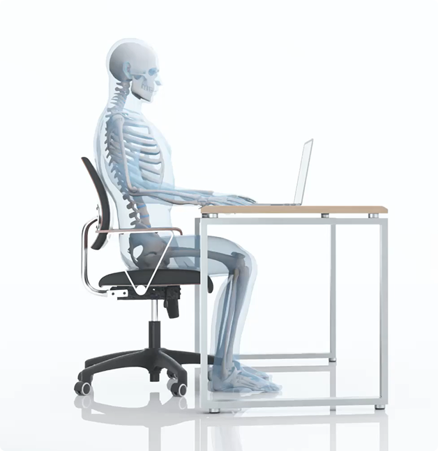 Skeleton sitting at desk